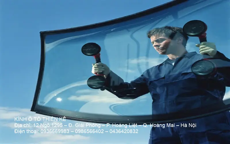 Repair technician with replaced windshield